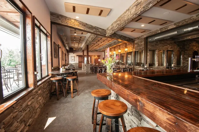 Beamed ceiling over a winery tasting room bar
