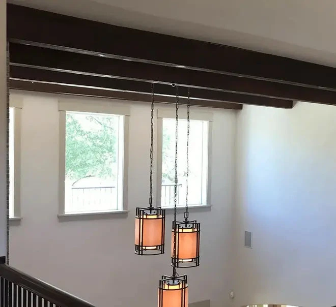 Decorative faux wood I-beam installation
